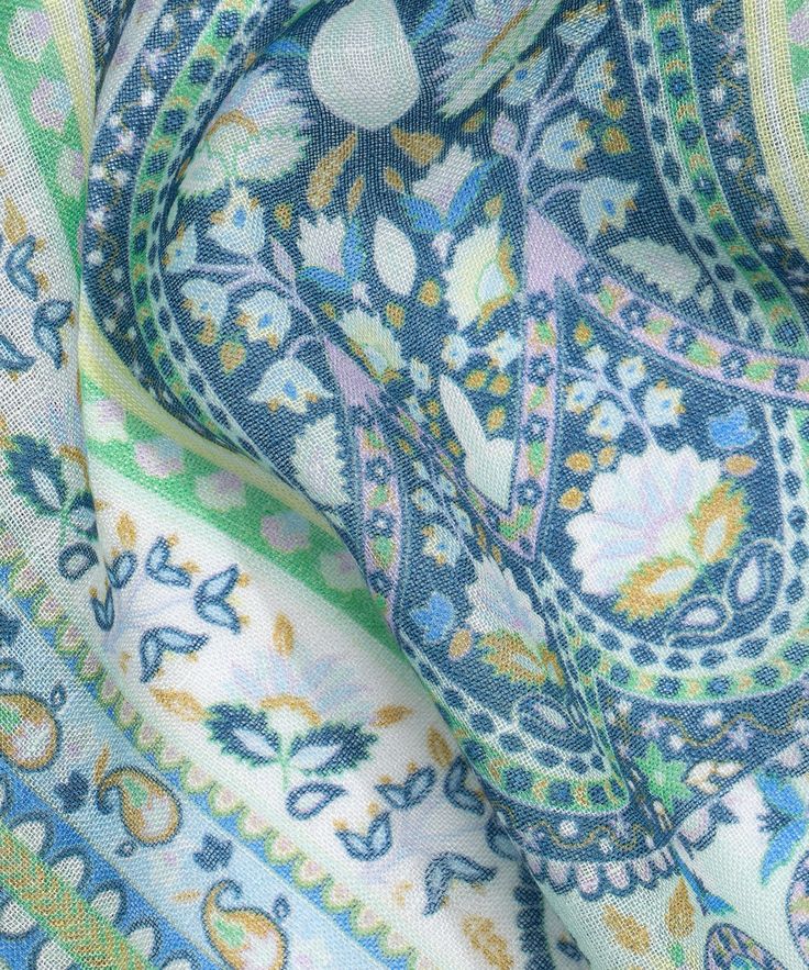 This lightweight, linen-blend wrap features an intricate, watercolor-inspired print that's modern-yet-timeless, and ready for sunshine. Dimensions: 27 in. x 72 in.Materials: 85% Modal, 15% Linen Bohemian Linen Scarves For Spring, Blue Bohemian Paisley Print Scarves, Blue Paisley Print Bohemian Scarf, Blue Bohemian Scarf With Paisley Print, Bohemian Patterned Scarves For Spring, Patterned Bohemian Scarves For Spring, Summer Floral Print Patterned Scarves, Blue Bohemian Scarves With Floral Print, Bohemian Printed Scarves For Spring