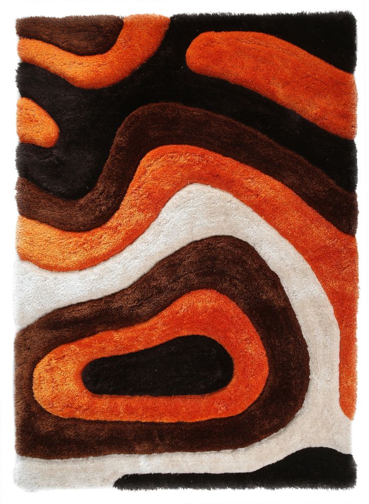 an orange, brown and white rug with wavy lines on the bottom half of it