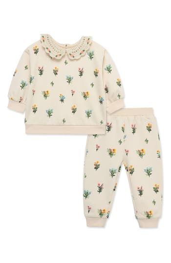 An allover floral print brings sweet flourish to this matching set that'll keep baby comfortable and cute no matter what the day brings. Top has back keyhole with button-and-loop closure; bottoms have elastic waist 79% cotton, 21% polyester Machine wash, tumble dry Imported Printed Playwear Sets For Spring, Spring Printed Sets For Playtime, Printed Sets For Playtime In Spring, Cute Floral Print Playwear Sets, Spring Printed Playtime Sets, Cute Floral Print Spring Sets, Cotton Playtime Sets With Floral Print, Cotton Floral Print Playtime Sets, Casual Floral Print Playtime Sets