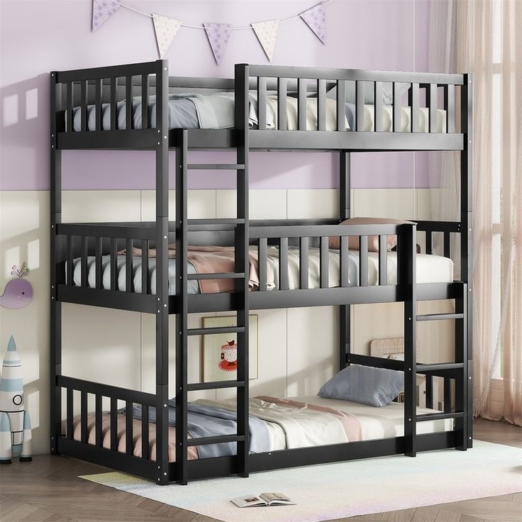 the bunk bed is black and has two sets of ladders on each side,