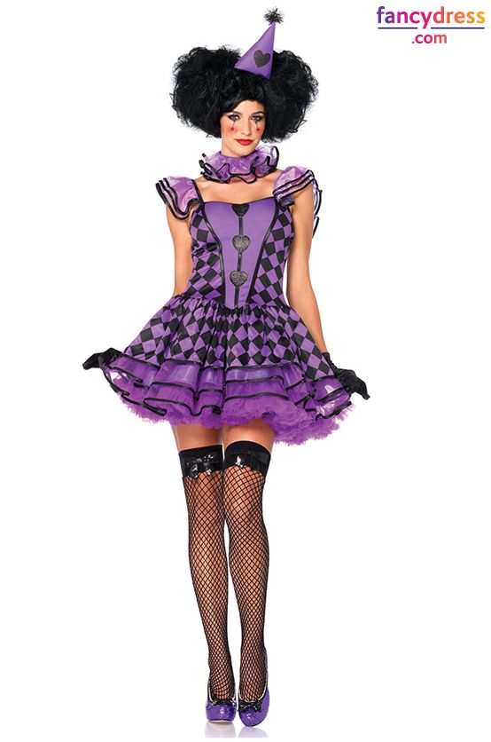 a woman wearing a purple and black costume