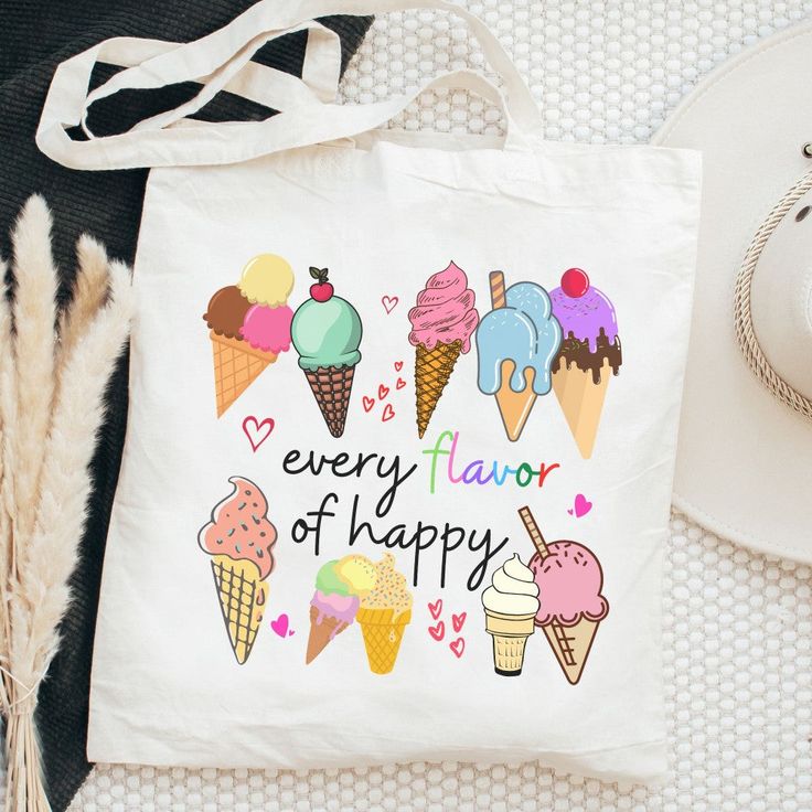 Show off your delicious style with this "Ice Cream Every Flavor of Happy 🍦🌈" tote bag! Featuring a colorful and playful design, this white tote will be your go-to for all of your activities - picnics, festivals, game day, school stuff and Holiday travels! You'll be feeling 'scoops' of happiness" everywhere you go! 🍨 This bag is a perfect way to showcase a bit of your personality! It is practical, stylish and environmentally friendly reusable. We hand press each item with love and care. 💙▸ Di White Canvas Bag For School Summer, Trendy White Bags For End Of School Year, White Letter Print Bag For Back To School, Playful White School Bag, White Playful School Bags, Fun White Canvas Bag For Everyday Use, White Playful School Bag, Playful White Canvas Bag For Everyday Use, Playful White Bags For Everyday