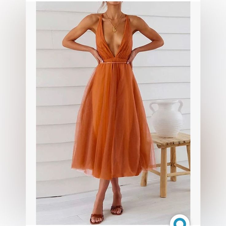 Never Worn Deep V-Neck Dress With Sexy Lace Up Back, And Flowing Mesh Layering. Calf Length Skirt, And A Beautiful Orange Color, And The Spaghetti Straps Wrap Nice Around The Waist. Great Summer Or Wedding Guest Dress. Backless V-neck Sundress For Brunch, V-neck Backless Sundress For Brunch, V-neck Backless Sundress For Date Night, Summer V-neck Dress With Spaghetti Straps For Night Out, Fitted Summer V-neck Party Dress, Summer Evening Backless Mesh Dress, Backless Summer Midi Dress For Party, Summer Backless Midi Dress For Party, V-neck Backless Sundress For Party