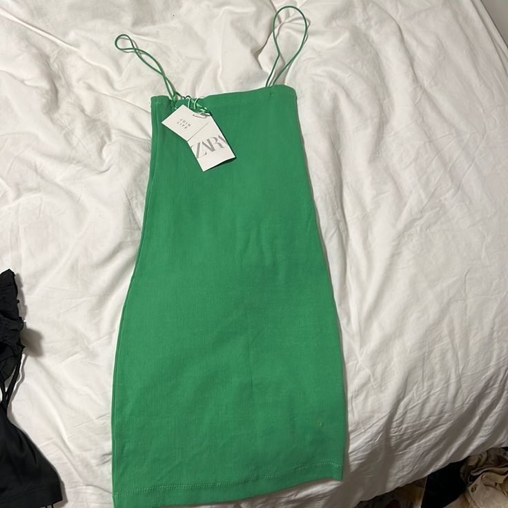 Brand New Green Cotton Sleeveless Dress For Spring, Casual Green Bodycon Summer Dress, Green Bodycon Sleeveless Dress For Spring, Chic Green Cotton Sundress, Chic Green Cotton Mini Dress, Green Mini Bodycon Dress For Spring, Green Midi Bodycon Summer Dress, Green Midi Bodycon Dress For Summer, Green Mini Length Bodycon Dress For Spring