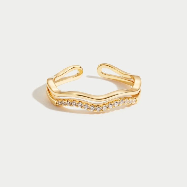 Timeless. Classic. Elegant. Add a touch of luxury to your everyday wardrobe with this stunning ring. Guaranteed to elevate any look.  18K Gold plated AAA cubic zirconia crystal Adjustable ring size -  fits size US5-7 or 8-10 Hypoallergenic, lead & nickel free  US/Canada Ring Size  UK/AU Ring Size  Inside Diameter ( Elegant Adjustable Crystal Ring In Diamond White, Elegant Adjustable Diamond White Crystal Ring, Elegant Tarnish-resistant Diamond Ring, Elegant Adjustable Crystal Ring With Sparkling Stones, Elegant Adjustable Rings With Vvs Clarity, Elegant Adjustable Cubic Zirconia Diamond Ring, Elegant Adjustable Diamond Ring With Cubic Zirconia, Elegant Cubic Zirconia Crystal Promise Ring, Elegant Adjustable Crystal Ring For Anniversary