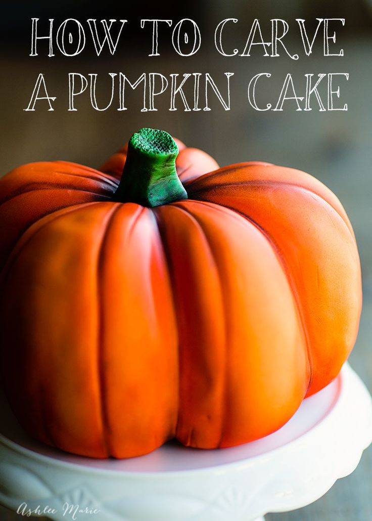 an orange pumpkin sitting on top of a white cake plate with the words how to carve a pumpkin cake