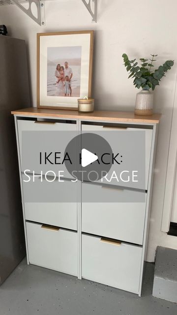 the ikea lack shoe storage cabinet is open and has two drawers on each side