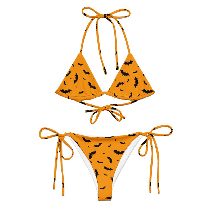 Stay comfortable and stylish all summer with this All-Over Print Recycled String Bikini set. It’s made from soft recycled polyester with double-layering and UPF 50+. Style the straps how you like, and get ready to swim! • Soft and stretchy material with UPF 50+ • Sizes up to 6XL • Bikini top comes with removable padding for comfort • Multiple ways to tie and style the bikini set • Color design options for swimwear lining Disclaimers: • Due to the 2-layered construction and internal stitching, a visible stitch may appear in the crotch seam of the bikini bottom. This is a normal part of the manufacturing process and does not impact the quality or performance of the product. • To make your All-Over Print Recycled String Bikini last longer, thoroughly rinse it off after each use and get rid of Orange Adjustable Triangle Top Swimwear, Yellow Swimwear With Adjustable Straps For Beach Party, Orange Nylon Swimwear For Vacation, Vacation Swimwear With Adjustable Straps And Stretch, Summer Orange Nylon Swimwear, Orange Nylon Swimwear, Adjustable Orange Beachwear Swimwear, Adjustable Orange Swimwear For Pool, Adjustable Yellow Swimwear For The Pool