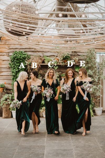 the bridesmaids are all dressed in black and green