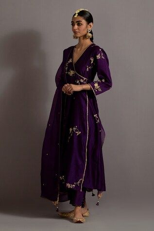 Aubergine kali angarkha with guccha jaal embroidered in zari, moti and zardozi scattered all-over. Comes with straight pant and guchha embroidered corners of organza dupatta. - Aza Fashions Luxury Zari Work Georgette Kurta, Luxury Georgette Kurta With Zari Work, Luxury Purple Kurta With Cutdana Details, Luxury Purple Kurta With Traditional Drape, Luxury Purple Chanderi Anarkali Set, Luxury Purple Unstitched Suit With Resham Embroidery, Luxury V-neck Salwar Kameez With Dabka Work, Luxury Purple Unstitched Suit With Floral Embroidery, Luxury Formal Churidar With Dabka Detailing