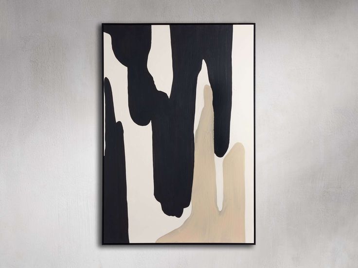 an abstract painting hangs on the wall