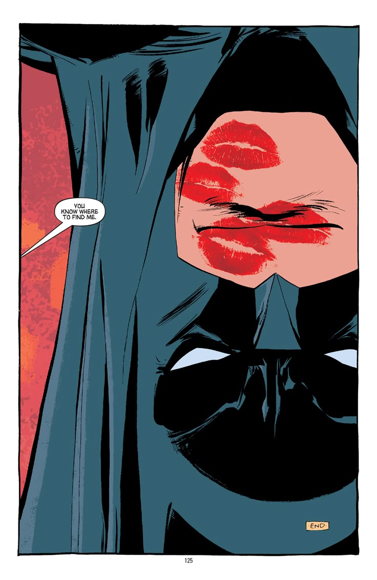 a comic page with an image of a woman wearing a batman mask and red lipstick