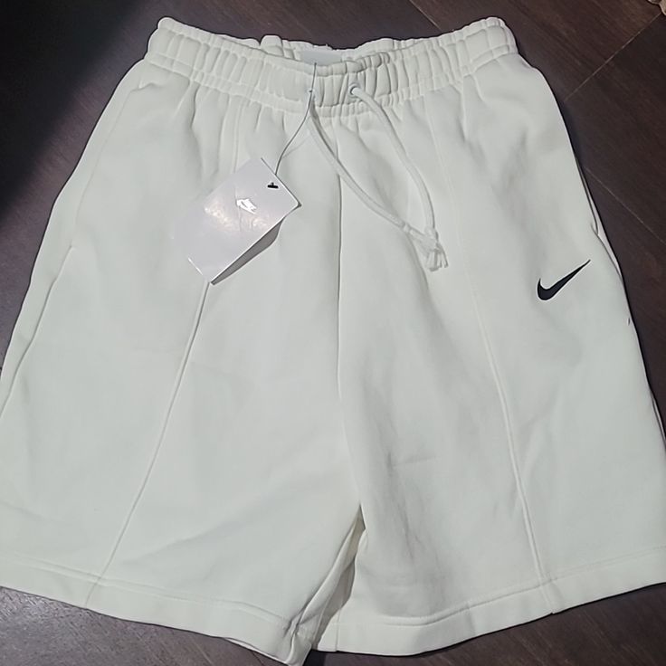 Nike Sportswear Essential Fleece High Rise Shorts Size Xs New W/Tags Smoke Free/ Pet Free Home Comfortable White Athletic Shorts For Loungewear, Comfortable White Athletic Shorts, Basic White Bottoms With Ribbed Waistband, White Sporty Shorts For Loungewear, Sporty White Shorts For Loungewear, Sporty Spring Sweats For Sports, Casual White Joggers With Drawstring, White Casual Shorts With Comfort Waistband, Nike Sweatpants For Spring Sports