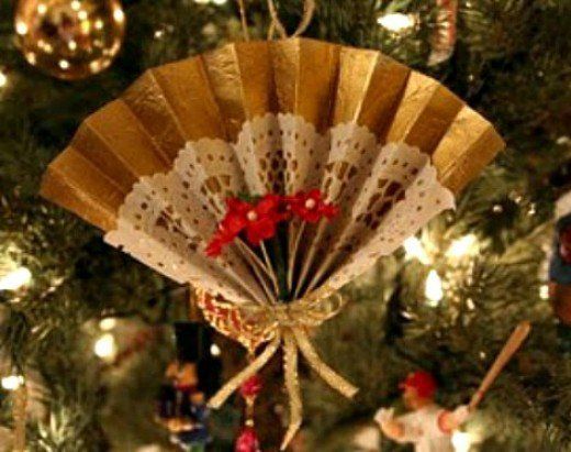 an ornament hanging from the christmas tree in front of a decorated christmas tree