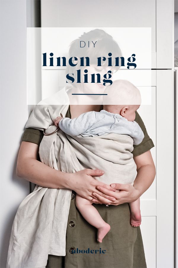 a woman holding a baby in her arms with the words, diy linen sling