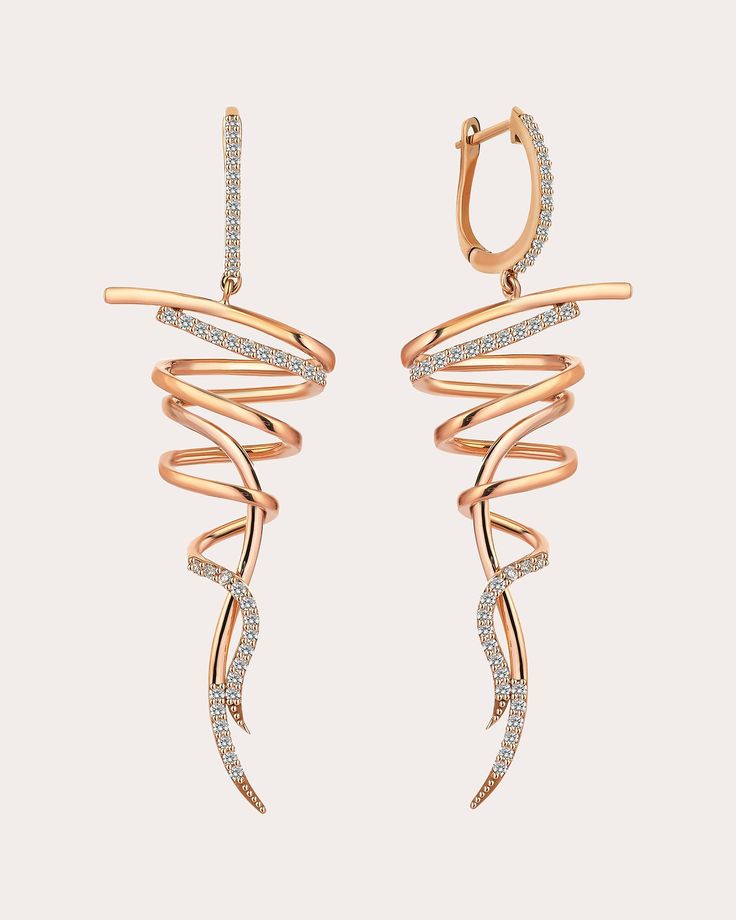 Sculpturally abstract, the Spire drop earrings form their swirled shape from 18-karat rose gold. Pavé-set diamonds create ambient shimmer. From Mevaris’ Modern Collection, an homage to the architectural and cultural heritage of Istanbul. Hinge click closure 18k rose gold and diamond Diamond carat: 0.5 ctw Diamond color: G Diamond clarity: VS1 Polish with soft cloth Handmade in Turkey Measurements Width: 0.75in Length: 1.6in Swirl Earrings, Gold Diamond Earrings, Diamond Carat, Diamond Color, Cultural Heritage, Rose Gold Earrings, Diamond Clarity, Long Earrings, 18k Rose Gold