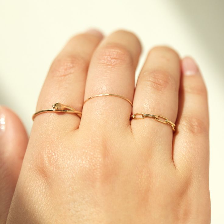 A shiny ring that cuts a cool line, with an uptown girl goes downtown, very New York feeling. Super super excellent in a stack, or on its own. Made with 100% recycled 14k gold. Everyday Simple Stackable Rings In Recycled Gold, Trendy Gold-plated Yellow Gold Stackable Rings, Trendy Gold Plated Stackable Yellow Gold Rings, Trendy Gold Plated Yellow Gold Stackable Rings, Trendy Yellow Gold Plated Stackable Rings, Everyday Gold Midi Rings Made Of Recycled Gold, Tarnish Resistant Recycled Gold Midi Rings, Everyday Rose Gold Stackable Rings In Recycled Gold, Modern Twist 14k Gold Midi Rings For Everyday