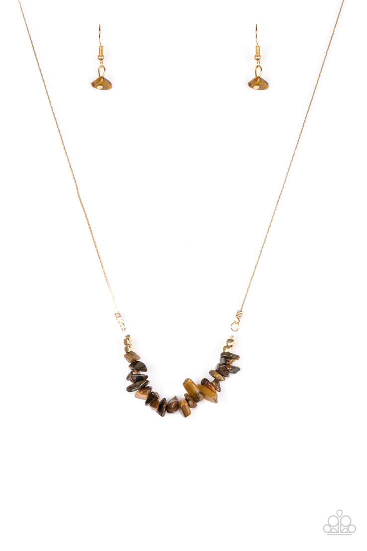 Attached to a dainty gold chain, bits of earthy brown rock are threaded along an invisible wire below the collar for a seasonal look. Features an adjustable clasp closure.

Sold as one individual necklace. Includes one pair of matching earrings. Brown Necklace Jewelry, Dainty Gold Chain, Earthy Brown, Brown Necklace, Natural Stones Necklace, Paparazzi Accessories, Back To Nature, Paparazzi Jewelry, Gold Chain Necklace