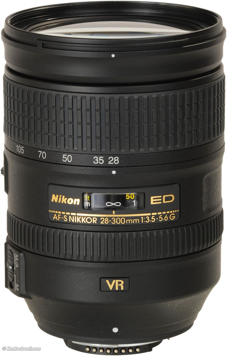 the nikon af 70mm f / 2 8 lens is shown in front of a white background