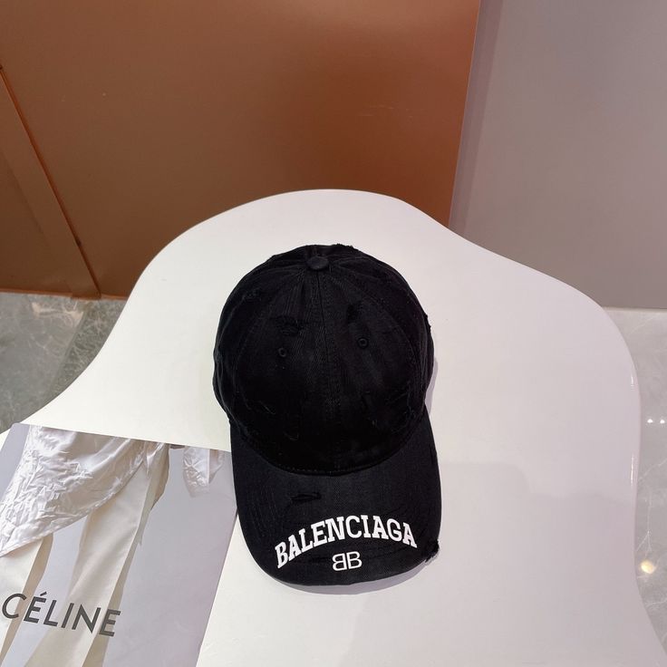 SHOP MORE LUXURY PRODUCTS HERE Description Balenciage Logo Visor Cap Black Cap BlackClassic baseball cap shapeAdjustable velcro tab at backBalenciaga logo embroidered on the visor Includes box, dust bag.This product is of the premium quality. Lv Multi Pochette, Dior Shirt, Louis Vuitton Artsy Mm, Gucci Shirt, Louis Vuitton Shirt, Louis Vuitton Artsy, Chanel Shirt, Balenciaga Logo, Visor Cap