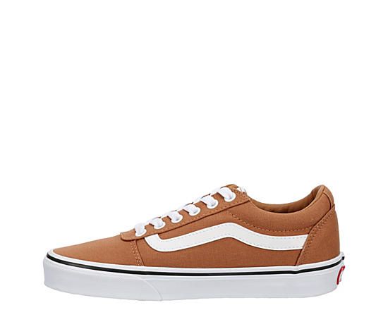 Vans Ward Lo Women's Sneaker Street style never looked as good as the Ward Lo women's Sneaker from Vans. The lightweight canvas upper featuring clean color or prints keeps your cool skater vibe intact. A Cushioned insole comforts your steps while the signature waffle outsole adds traction. Canvas upper Lace-up closure Stitching detailsVulcanized midsoleWaffle Rubber outsole Casual Vans Canvas Shoes, Casual Brown Vans Skate Shoes, Vans Brown Sneakers For Spring, Brown Vans Sneakers For Spring, Casual Brown Canvas Shoes, Casual Brown Canvas Shoes For Spring, Vans Canvas Shoes For Skateboarding In Spring, Vans Casual Canvas Shoes, Brown Vans Sneakers