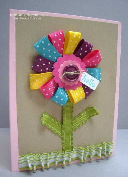 a handmade card with a flower on it