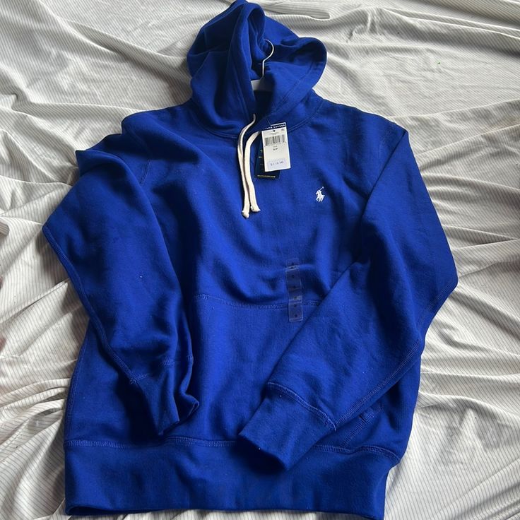 Never Been Worn Brand New Hoodie Blue Hooded Sweatshirt For Winter, Blue Hooded Winter Sweatshirt, Blue Fleece Hoodie For Winter, Casual Blue Fleece Outerwear, Blue Hooded Jacket With Drawstring And Long Sleeves, Blue Hooded Jacket With Drawstring For Streetwear, Blue Long Sleeve Hooded Jacket With Drawstring, Blue Hooded Winter Jacket With Ribbed Cuffs, Blue Long Sleeve Hoodie With Adjustable Hood