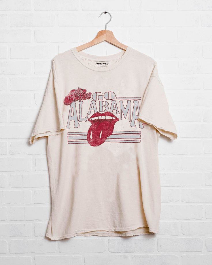 Rolling Stones University of Alabama Stoned Off White Thrifted Tee - shoplivylu Vintage Relaxed Fit T-shirt For College, Vintage Faded T-shirt With Screen Print, Vintage T-shirt For Spring Streetwear, Vintage Graphic Print T-shirt For Fall, Vintage Cotton Shirt For Fan Merchandise, Vintage Shirt With Graphic Print For Fans, Faded Casual T-shirt With Screen Print, Acid Wash Pre-shrunk T-shirt For Fall, Vintage Graphic Print Shirt For Fans