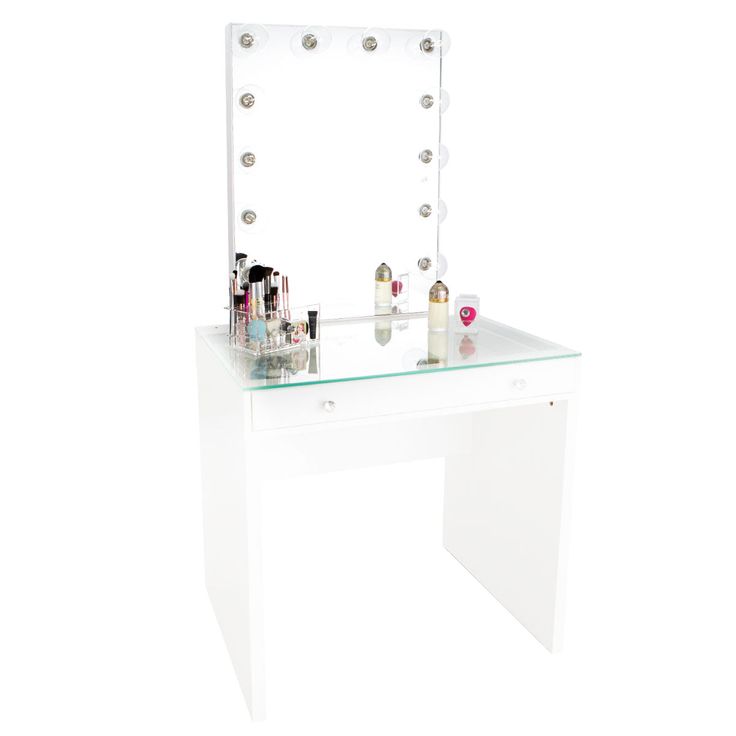 a white vanity table with a lighted mirror and various makeup products sitting on top of it