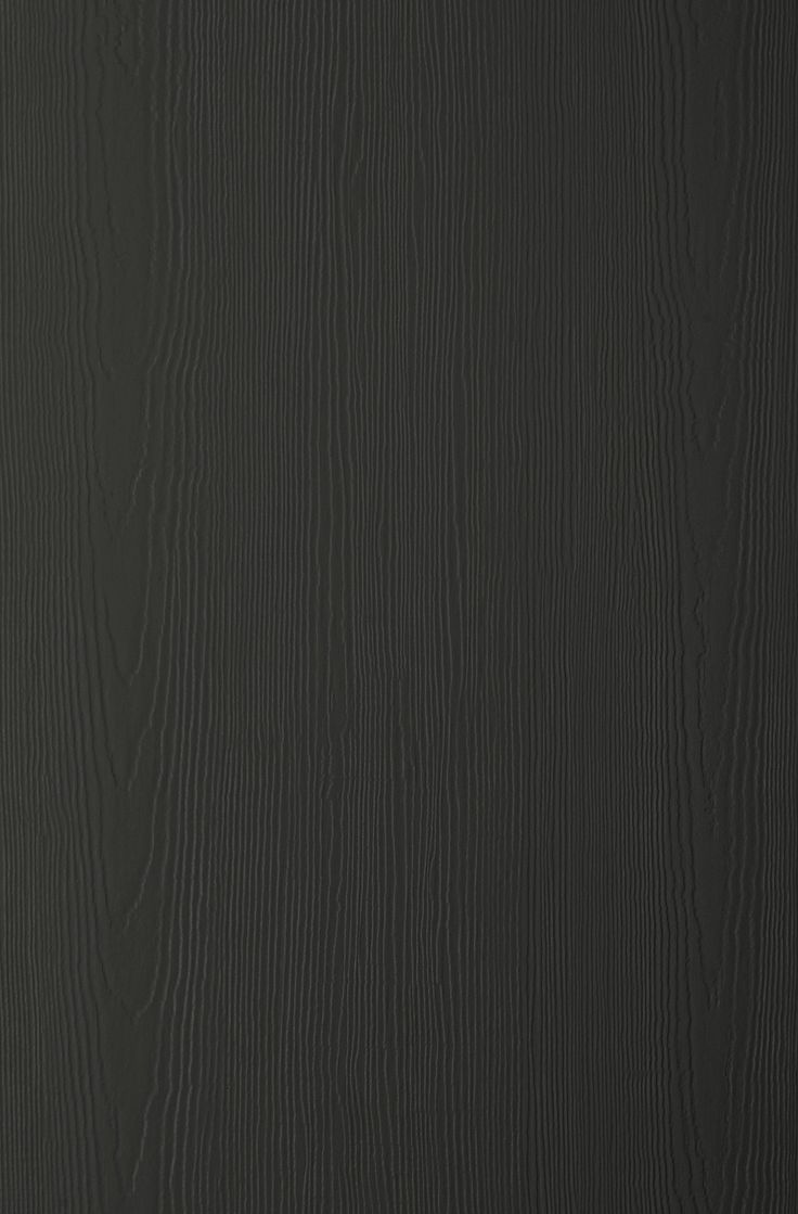 black wood grain textured wallpaper with dark grey stain on the top and bottom