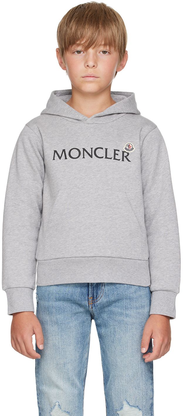 Cotton fleece hoodie. · Logo printed at chest · Felted logo patch at chest · Kangaroo pocket · Rib knit hem and cuffs · Machine-wash Supplier color: Grey Model measures 54 / 137 cm tall and wears size 8. Moncler Enfant Size: child's height 8: 51.2 / 130 cm 10: 55.2 / 140 cm 12: 59.8 / 152 cm 14: 64.6 / 164 cm Long Sleeve Cotton Hoodie With Logo Patch, Cotton Hoodie With Logo Patch, Casual Hoodie Sweatshirt With Logo Patch, Fall Logo Patch Hoodie Sweatshirt, Fall Hoodie Sweatshirt With Logo Patch, Casual Fall Hoodie With Logo Patch, Casual Hoodie With Logo Patch For Fall, Winter Hoodie Sweatshirt With Logo Patch, Hooded Fall Hoodie With Logo Patch