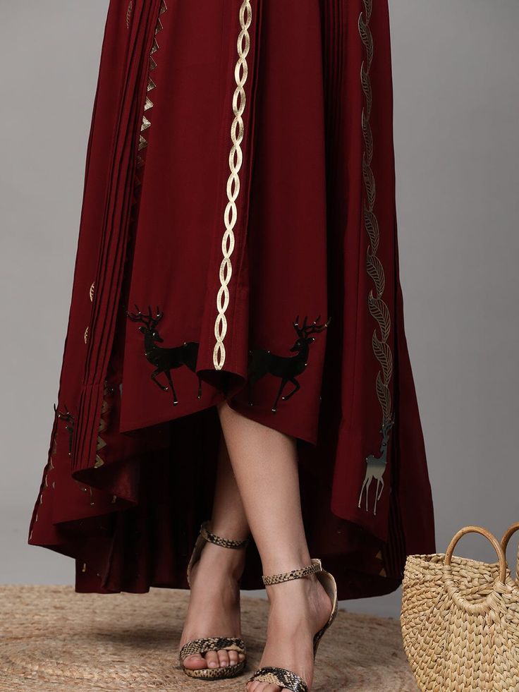 Maroon Georgette Anarkali suit and pants set with golden cutwork. The intricate details and luxurious materials make this ensemble a truly special piece to add to your wardrobe. Every detail has been thoughtfully crafted to elevate your style to the next level. Red Silk Anarkali Set With Intricate Embroidery, Red Intricate Embroidered Anarkali Set For Transitional Season, Transitional Red Motif Anarkali Set, Red Embellished Fitted Anarkali Set, Transitional Red Intricately Embroidered Anarkali Set, Georgette Anarkali Suits, Upcycled Tote, Georgette Anarkali, Pop Up Event