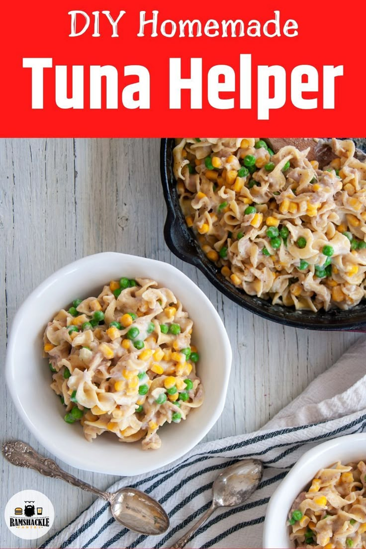 two bowls filled with pasta and peas on top of a table