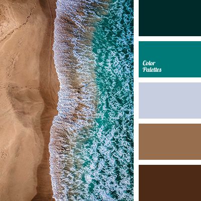 an aerial view of the ocean and beach with brown sand, green water and blue sky