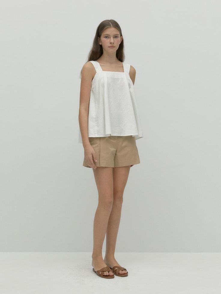 This is a trendy and feminine top by DEPOUND that is made out of high quality and sturdy material. With distinctive mood of the design and casual look, you can style it for your comfortable daily outfit.- Tuck detail on front and back- Flared silhouette- Feminine and casual mood Chic Cotton Cami Tank Top, Beige Fitted Sleeveless Top, Casual Sleeveless Cotton Blouse, Chic Sleeveless Blouse, Chic Tank Blouse, Chic Cami Tops For Workwear, Chic Cami Tops For Work, Chic Beige Tank Top For Daywear, Versatile Sleeveless Blouse For Everyday