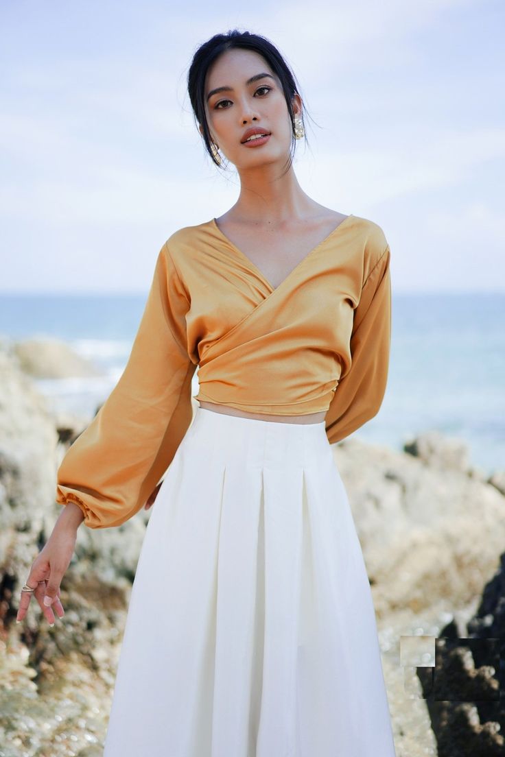 Seamlessly merging boldness with elegance, VAST's sleek approach to even the most casual of pieces ensures that you always look stylish, as showcased by this wrap top. Featuring a V neck, back tie fastening and classic long bishop sleeves. Wrap Top Outfit, V Neckline Blouse, Peasant Sleeve, Silk Tops, Romantic Outfit, Wrap Shirt, Silk Wrap, Wrap Blouse, V Neckline