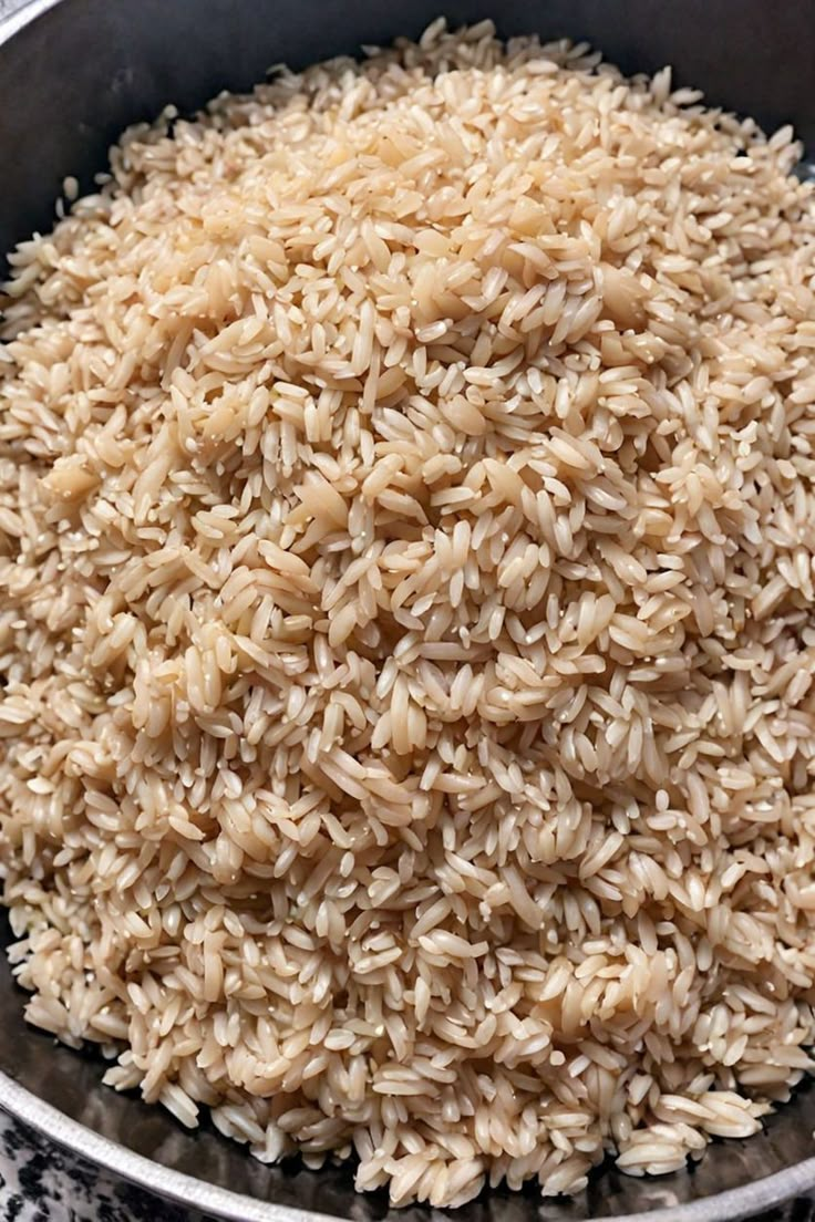 Learn How to Cook Brown Rice Stove Top Brown Rice, Brown Rice Cooking Instructions, How To Flavor Brown Rice, Wild Brown Rice Recipes, Cooking Brown Rice On Stove, Simple Brown Rice Recipes, Brown Rice Aesthetic, Brown Rice Stovetop, Southern Brown Rice