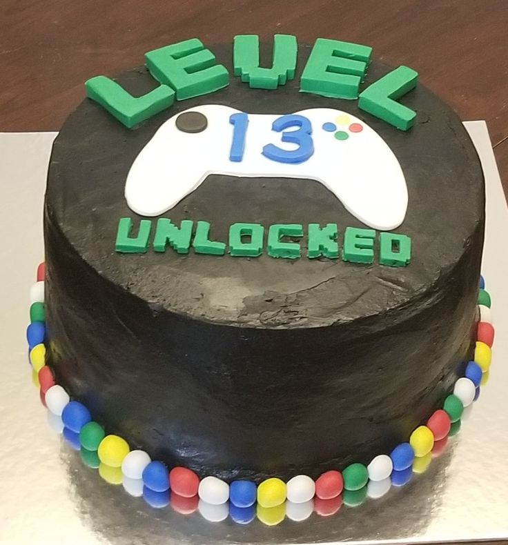 a birthday cake with a video game controller on it