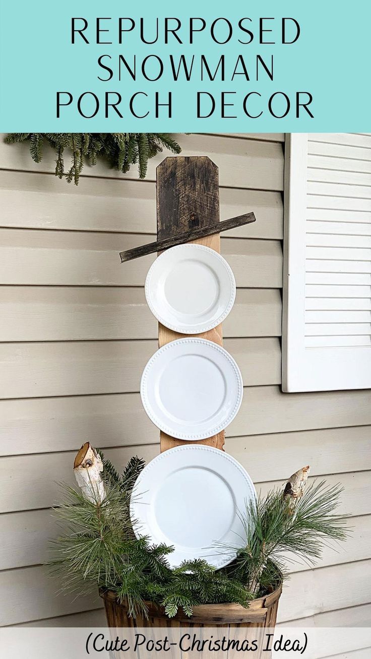 Snowman made from white dinner plates found at the thrift store. January Outdoor Decor, Christmas Decor Upcycle, Farmhouse Winter Porch Decor, Snowman Winter Decor, Winter Topiary Outdoor, Outdoor Winter Porch Decor, Winter Decor Ideas For The Home After Christmas, Winter Porch Decor After Christmas, Winter Front Porch Decor After Christmas