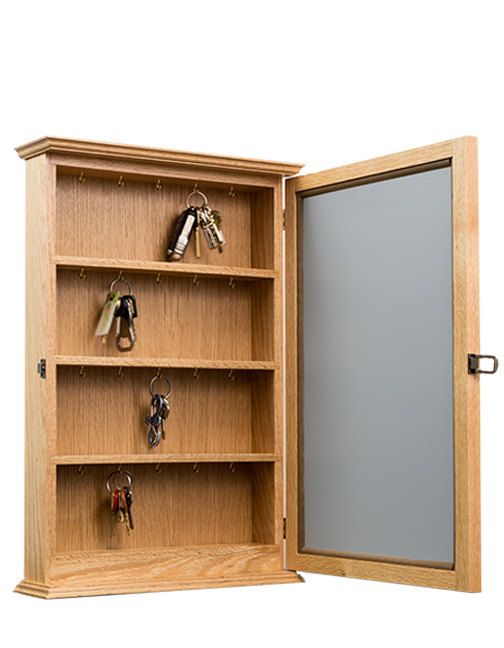 an open wooden bookcase with key hooks