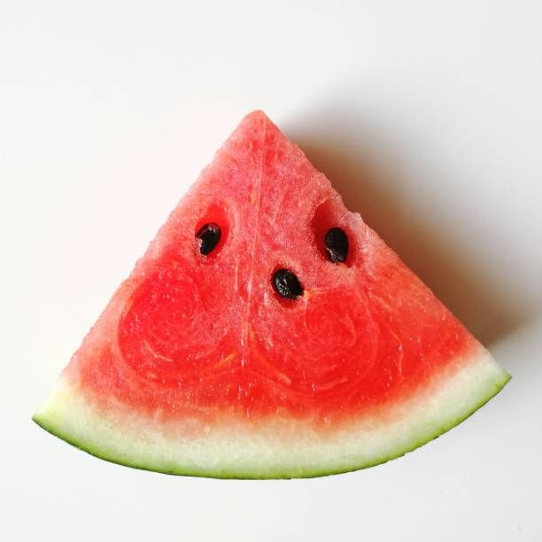 two slices of watermelon on a white background