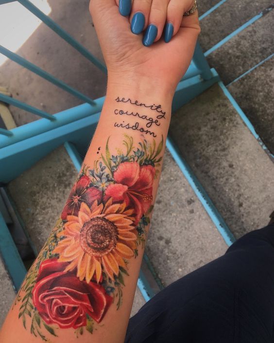 a woman's arm with a sunflower and roses tattoo on the left wrist