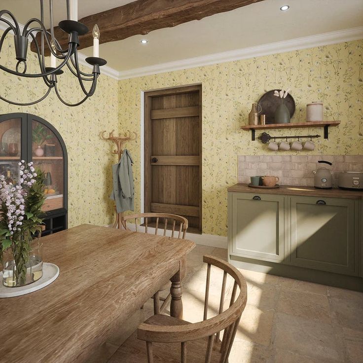 a large wooden table sitting in a kitchen under a chandelier