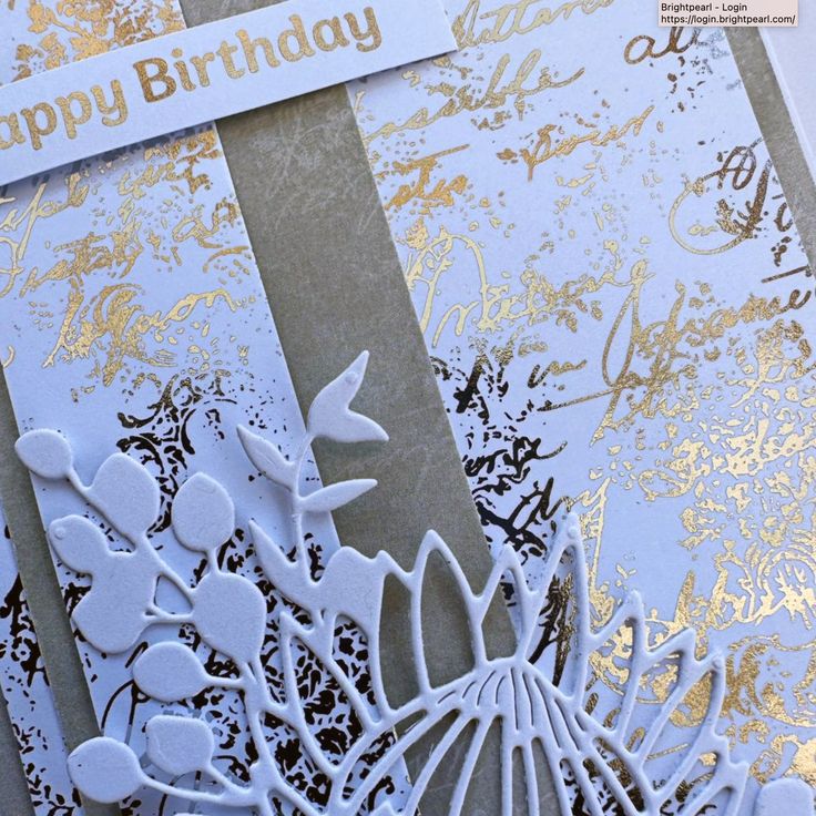 a close up of a birthday card with flowers