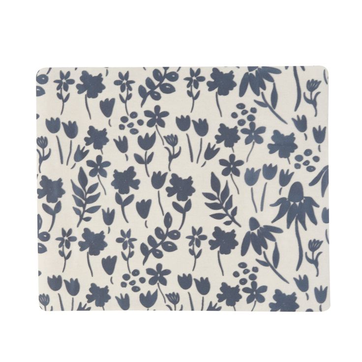 a blue and white flowered placemat