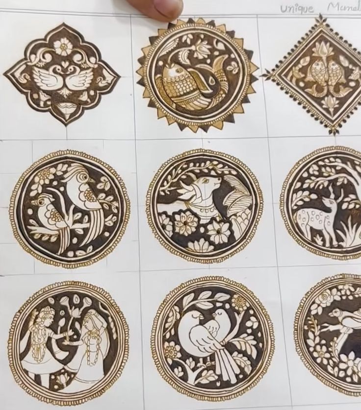 six different designs are shown in gold and black on white paper, with one hand holding the