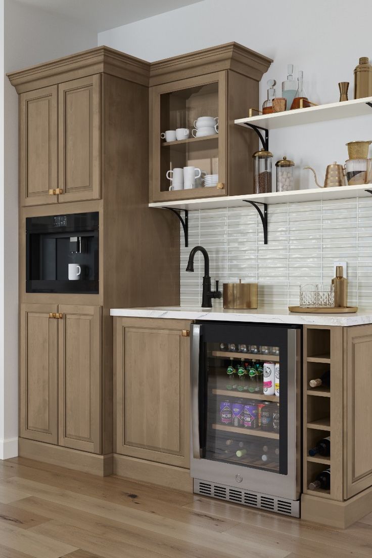 a kitchen with wooden cabinets and an appliance in the center, including a wine cooler