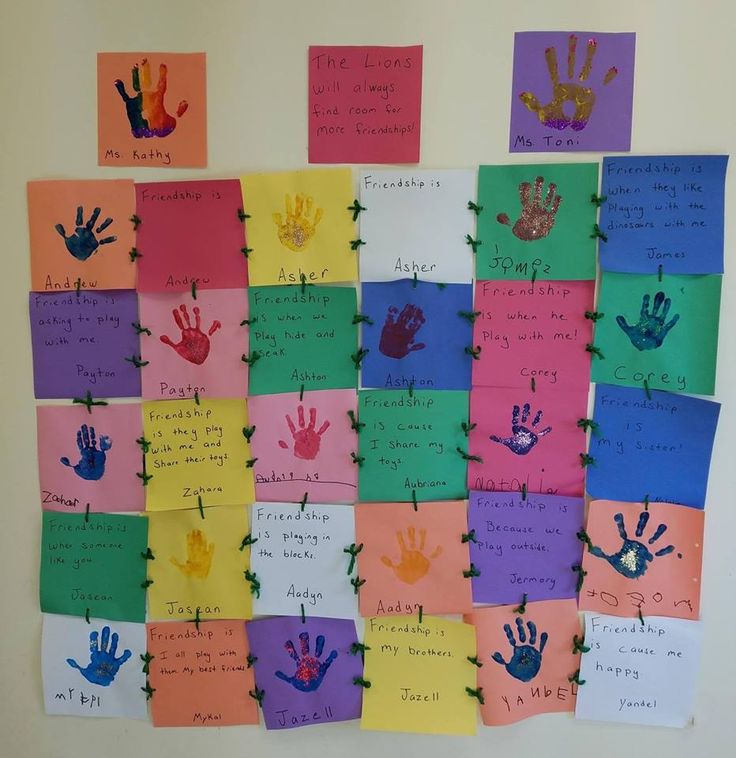 a bulletin board with handprints on it