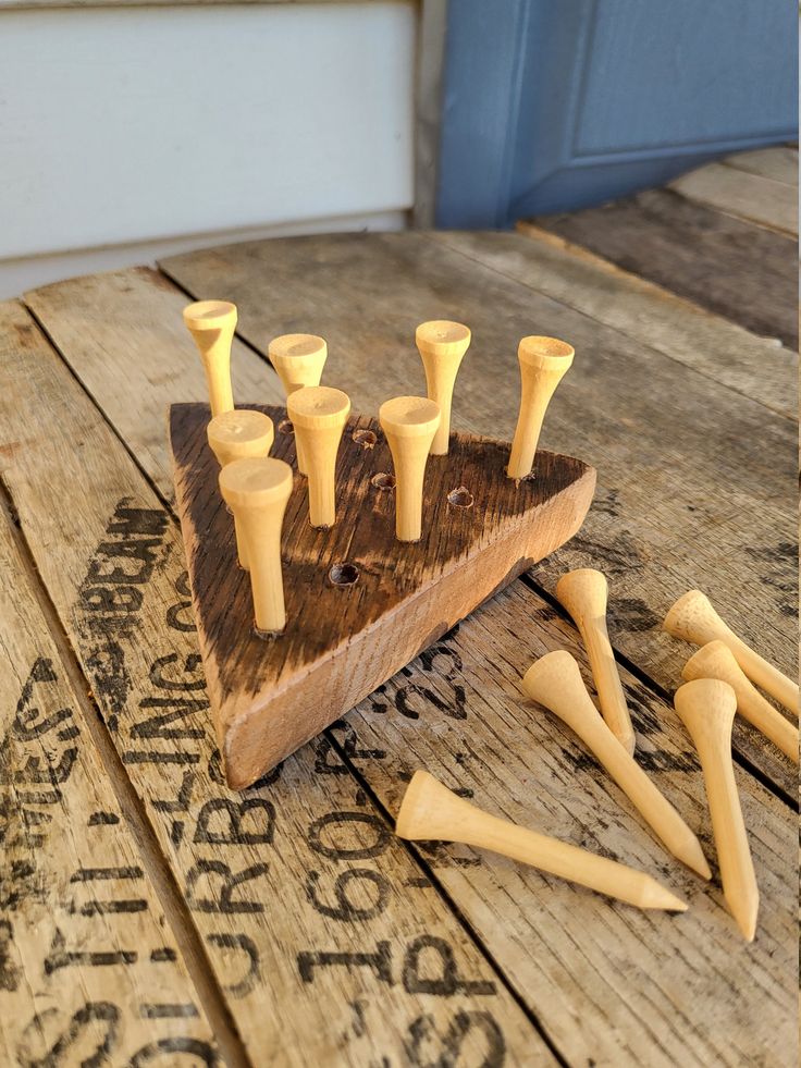 a set of wooden pegs sitting on top of a table