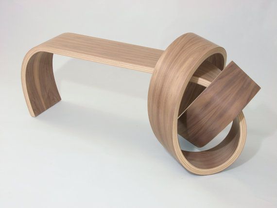 a wooden bench that has been designed to look like an object